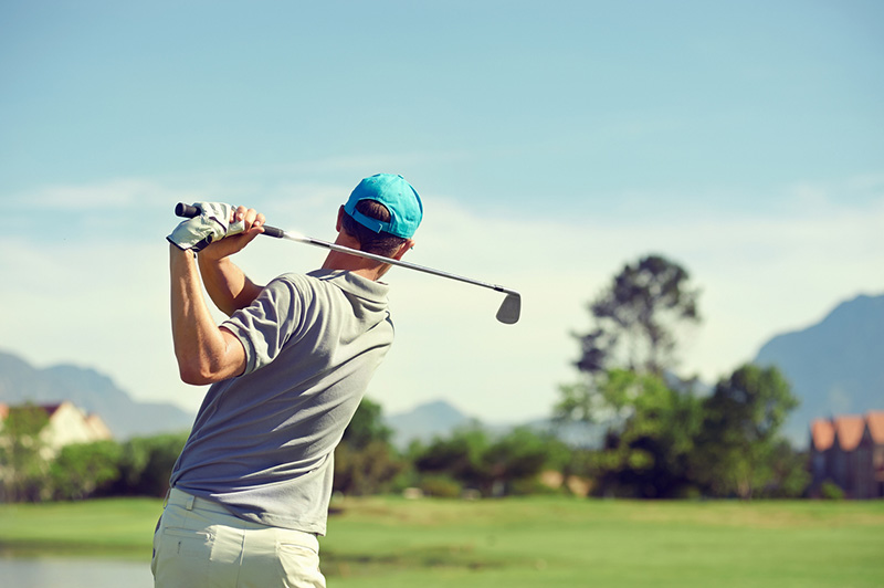 golfer follow through with back twisted